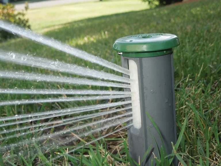 residential sprinkler system watering lawn
